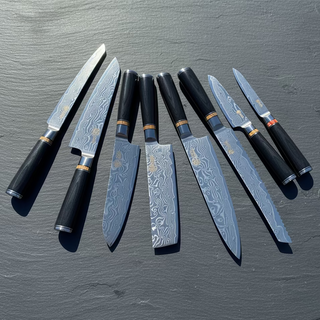 Set of Damascus steel kitchen knives on a stone surface 8 pc steel knife