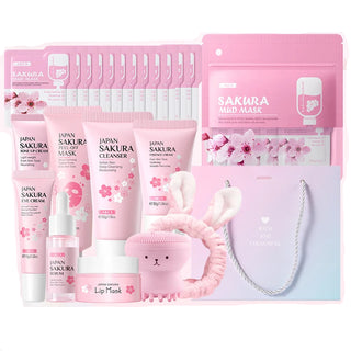 Set of Sakura skincare and beauty products including face masks, cleanser, and scrub on a pink background.