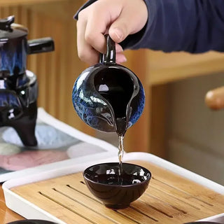 The Kung Fu Teapot Collection 8-Piece Semi-Automatic Chinese Ceramic Purple Clay Tea Set